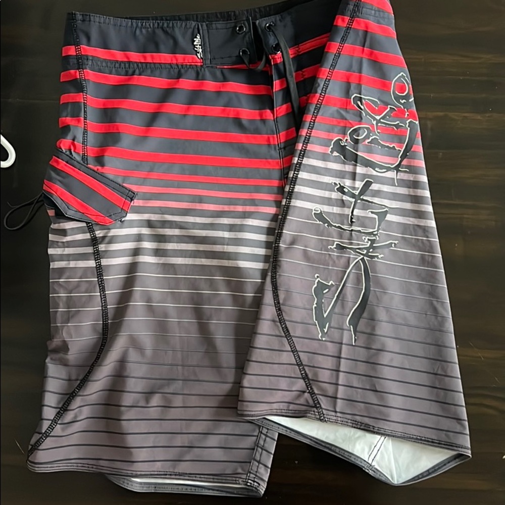 Mens board shorts-gray, black, and red.